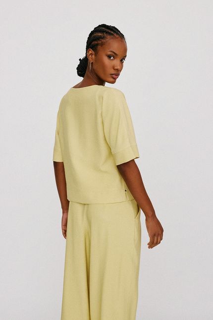 Blusa detalhe ilhós bege camurca