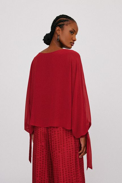 Blusa canoa punho ilhós marrom serrado