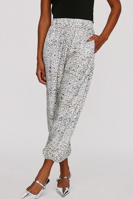 Calça elástico animal print bege palha