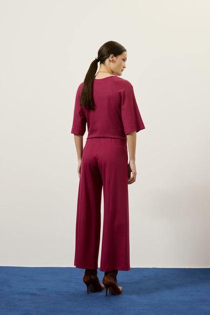 Calça malha cropeed recorte rosa mambo