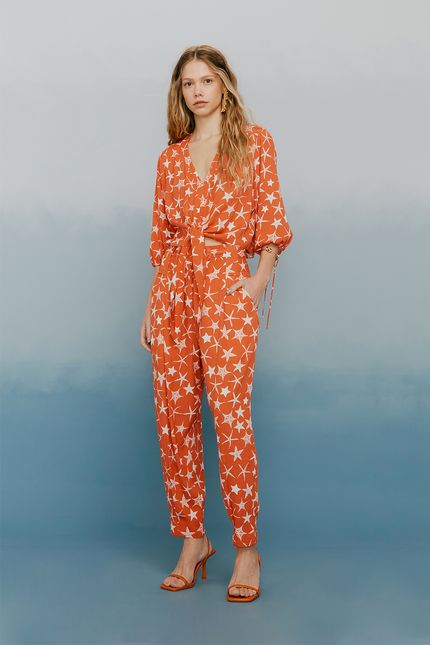 Calça fivela constelação laranja tropical